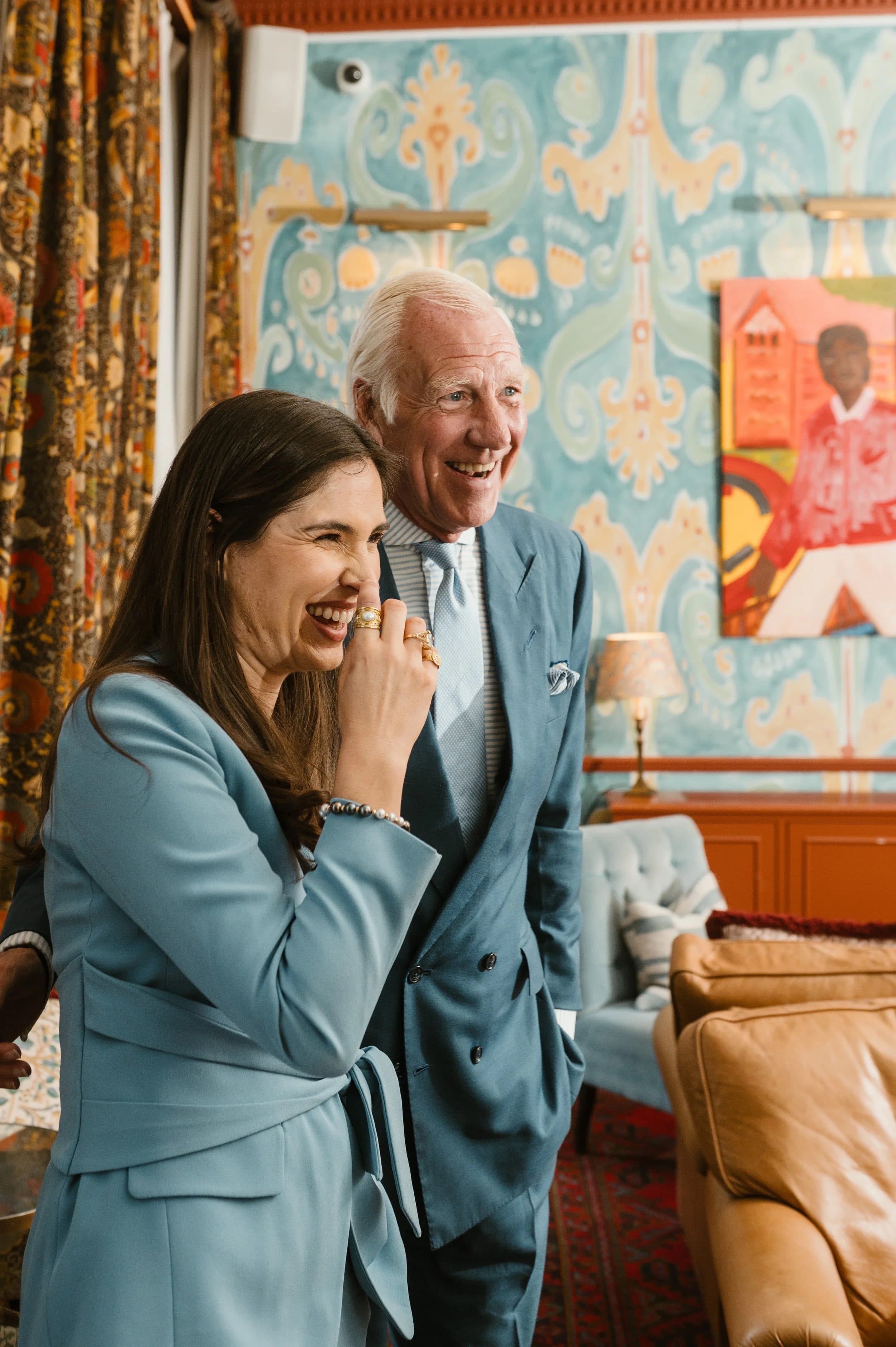 Guests laughing together at the MTArt Agency launch at Home House, London