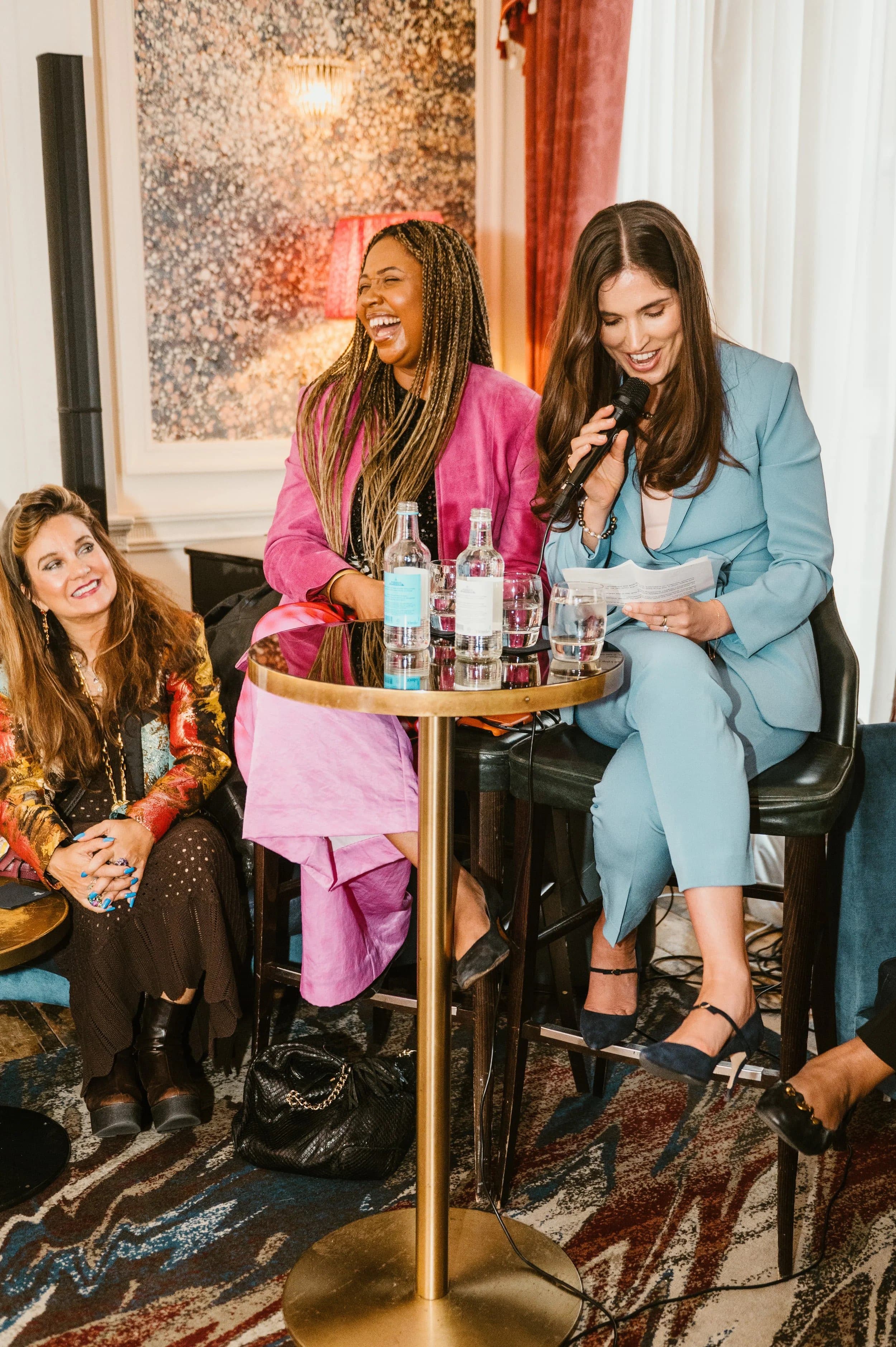 Two speakers in conversation at a London launch event