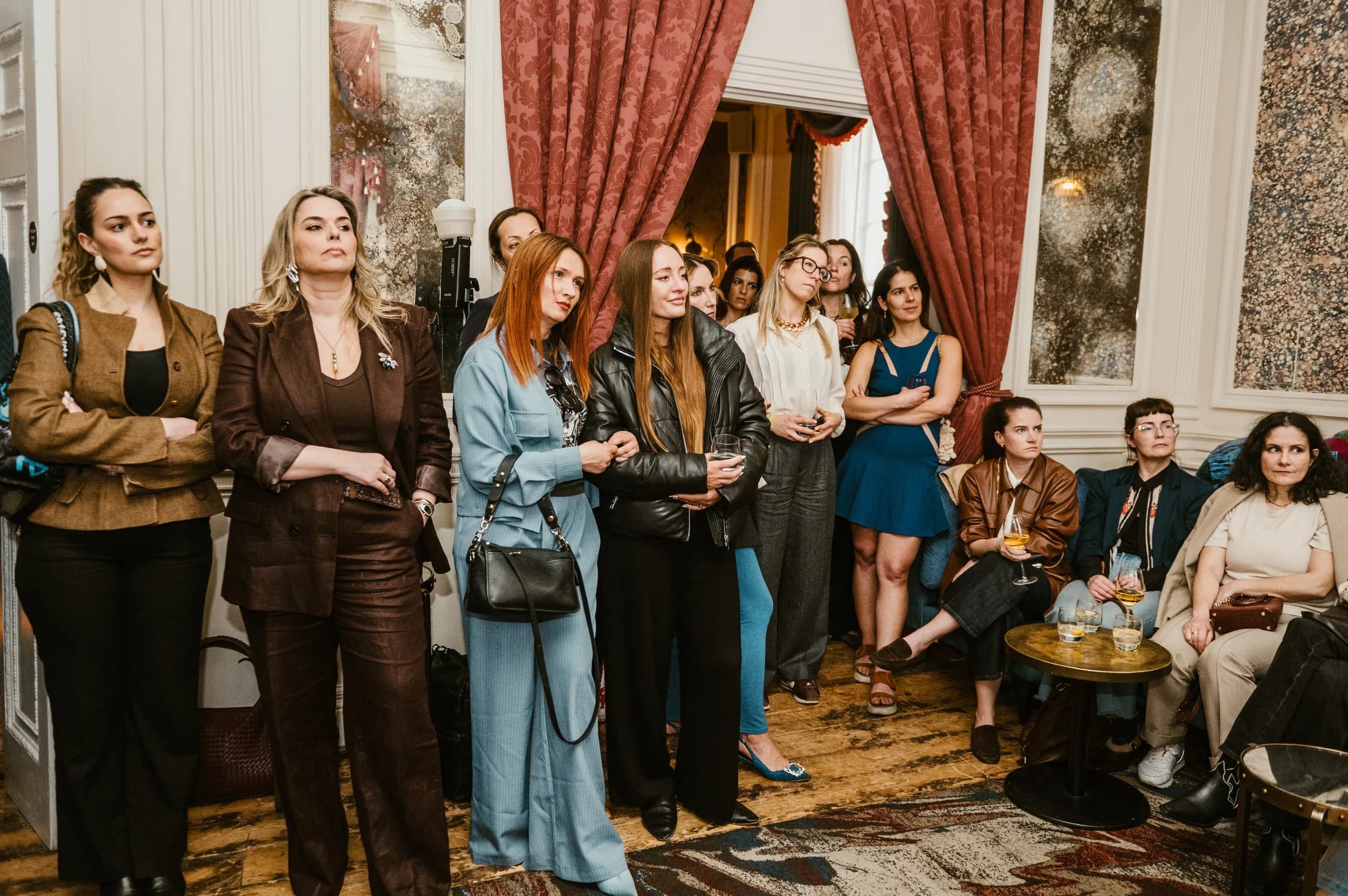 Guests gathered and listening at the MTArt Agency launch at Home House, London